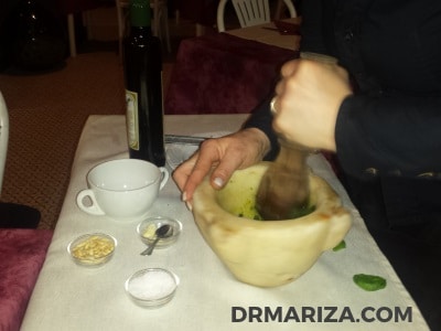 Fresh pesto, handmade at tableside with a mortar and pestle - a specialty of Liguria